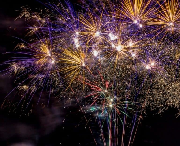 Colorful fireworks illuminate the night sky. Colorful fireworks illuminate the night sky.